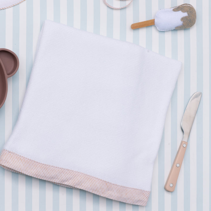 Copertina culla in filo di cotone bianco con bordo arancio