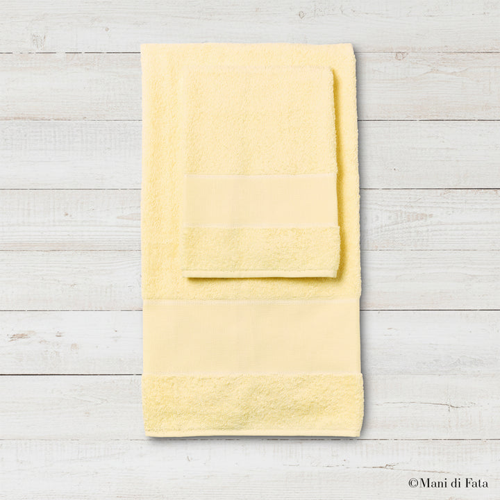 Parure spugna gialla Asti ricamo punto croce