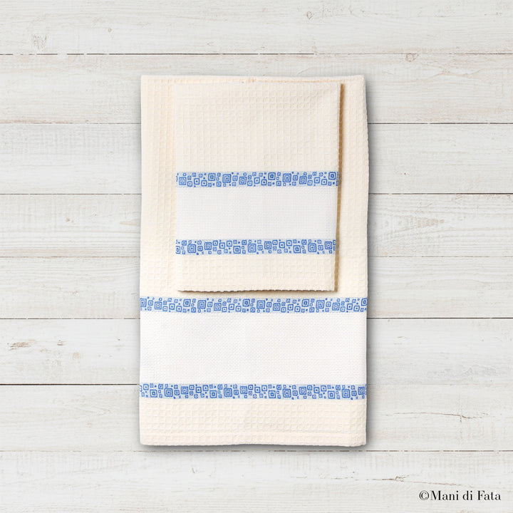 Parure nido d'ape con greca ricamo a punto croce