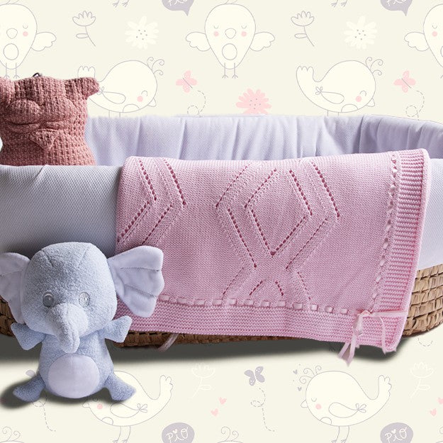 Copertina culla in lana rosa Rombi