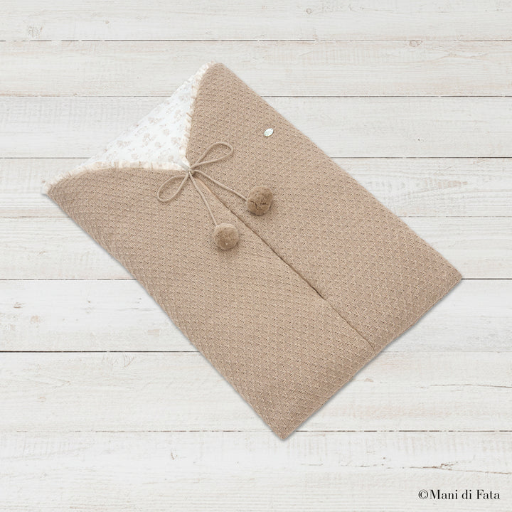 Sacco nanna in lana beige con pompon