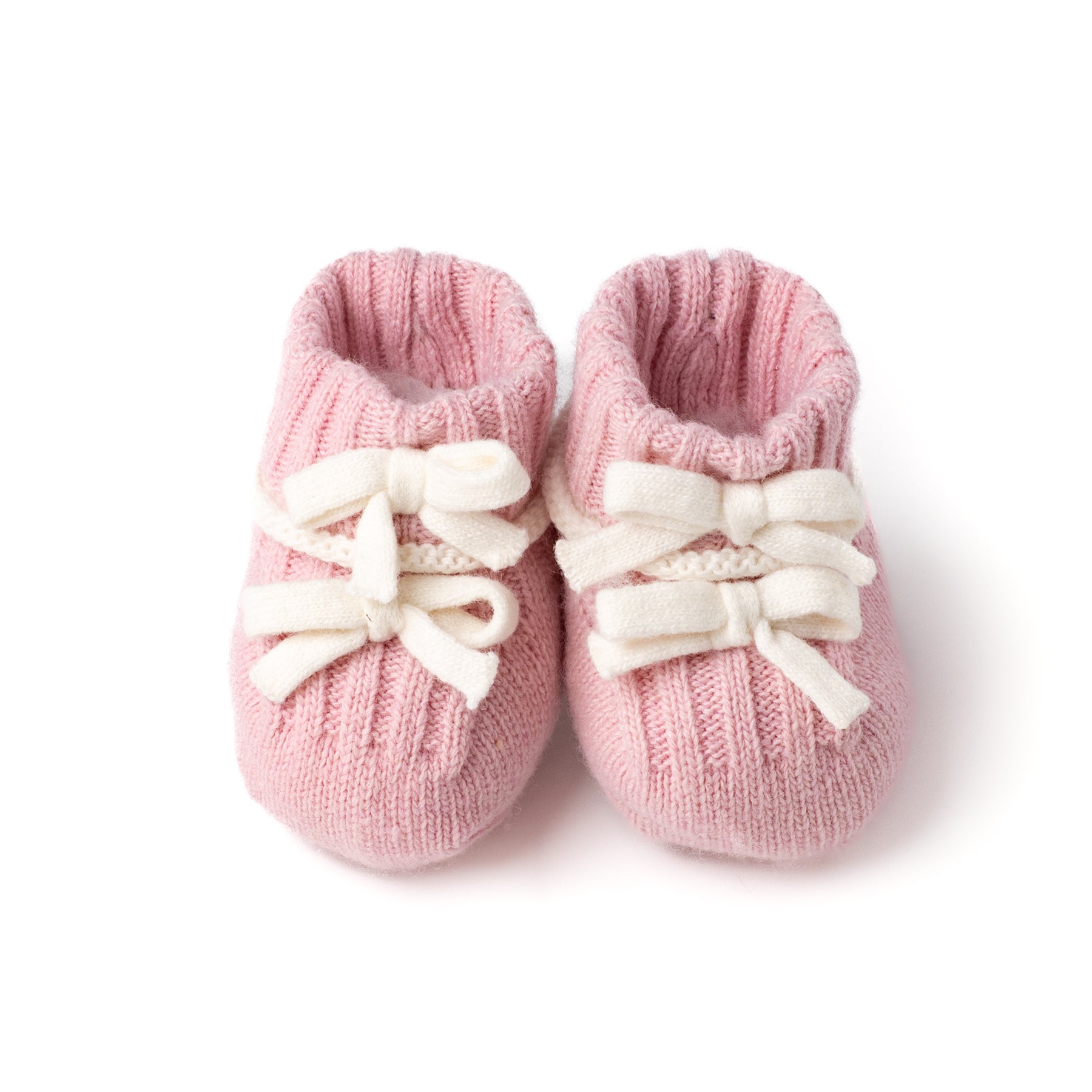 Babbucce in lana rosa con fiocchetti