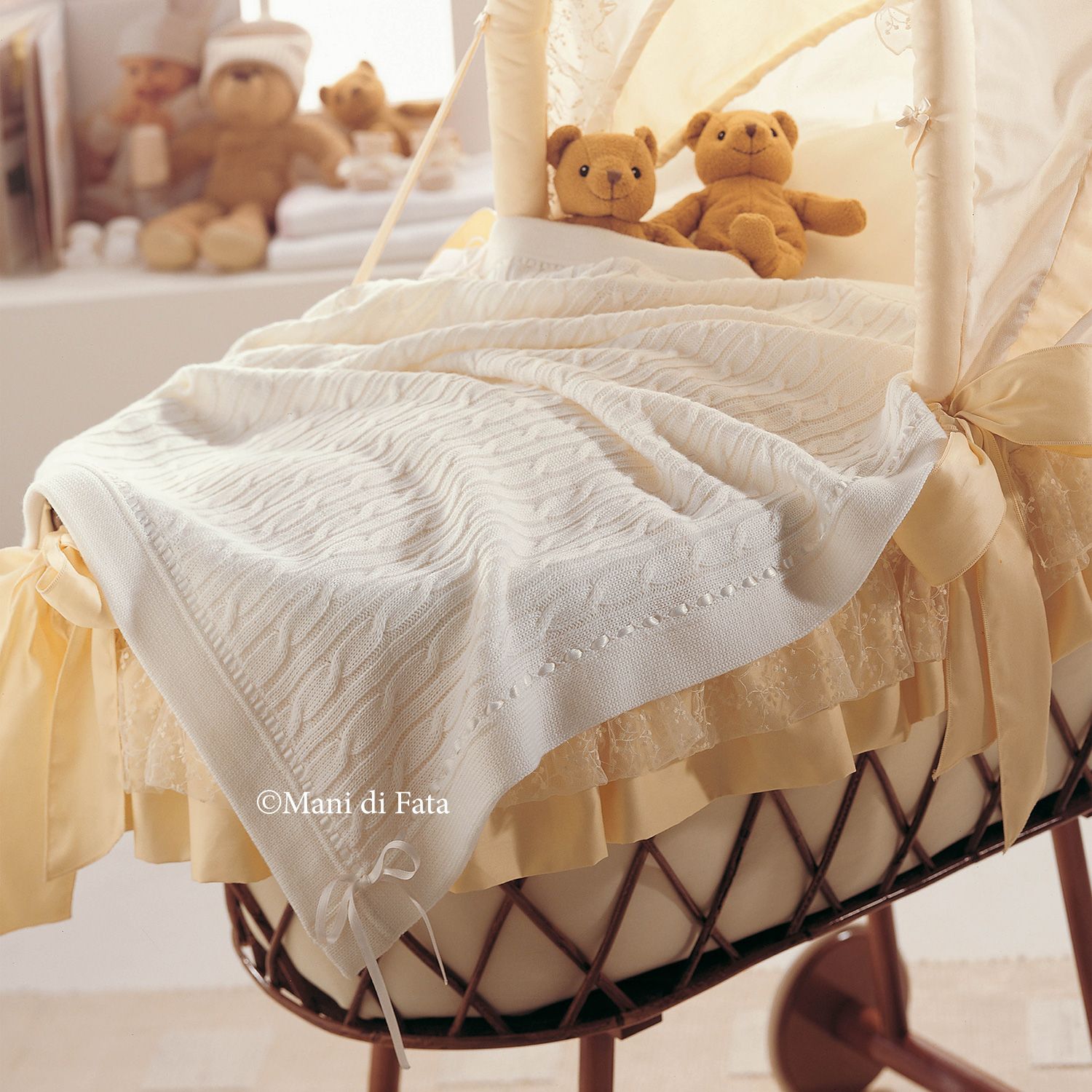 Copertina culla in lana bianca motivo trecce