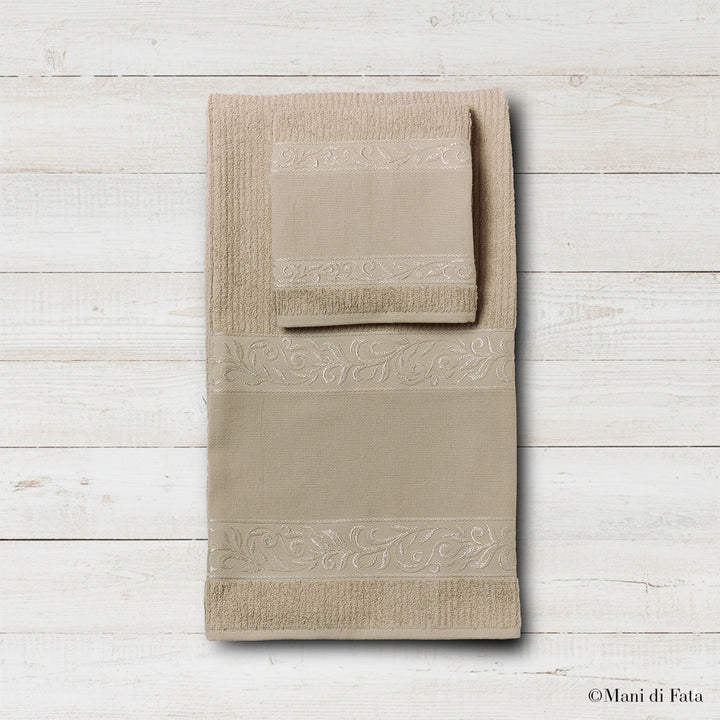 Parure spugna fango Verona ricamo a punto croce