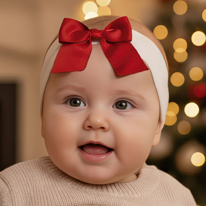 Fascetta in spugna con fiocco in raso