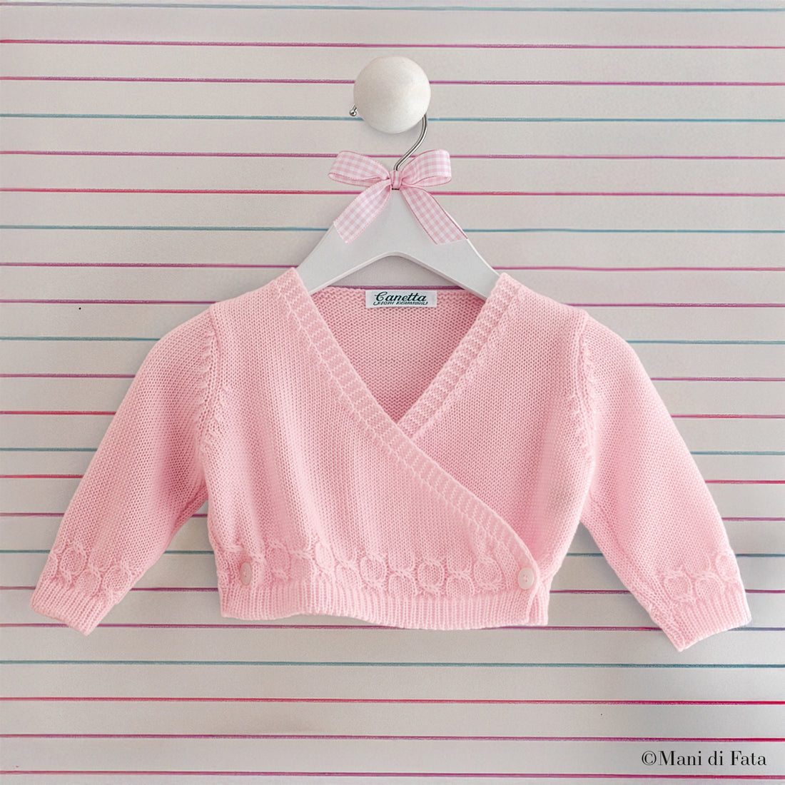 Incrociatino lana rosa lavorazione a catena 