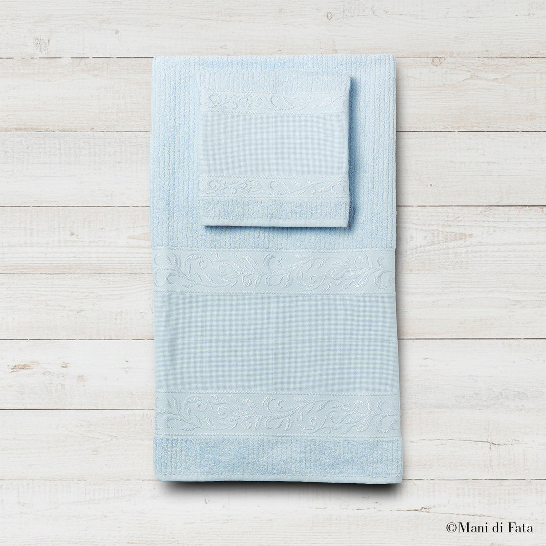 Parure spugna celeste Verona ricamo punto croce