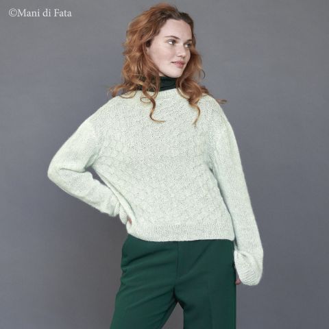 Spiegazione maglia verde chiaro a ferri con manica raglan